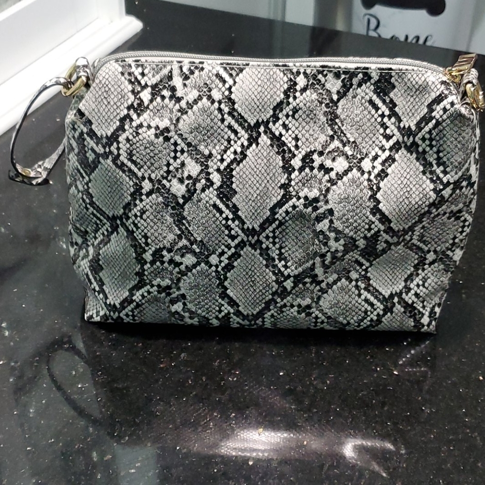 Snake print clutch